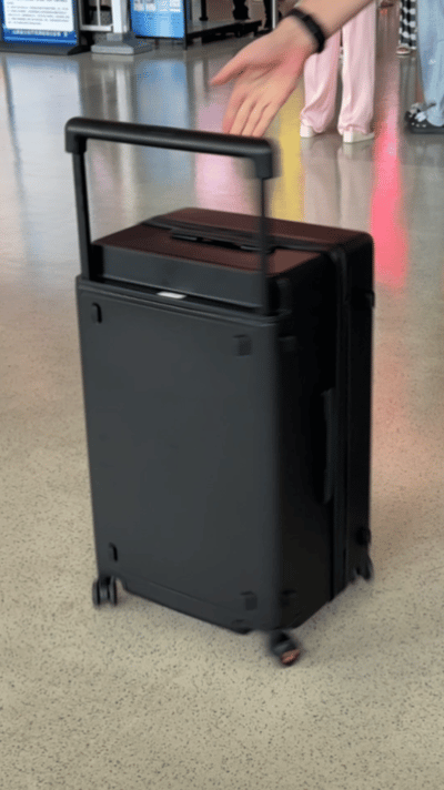 拖著地平線8號大旅行家行李箱打卡歌迷之城!_新浪眾測